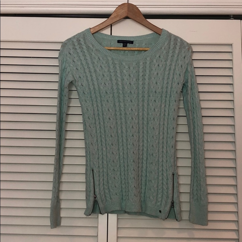 mint sweater with zipper detail